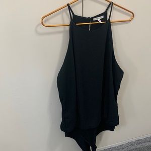 Black flounce haltered spaghetti strap body suit with peep hole back.